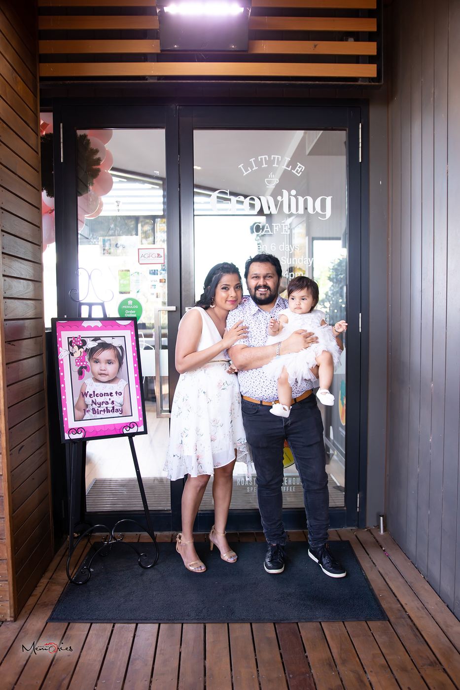 Family standing outside an event venue